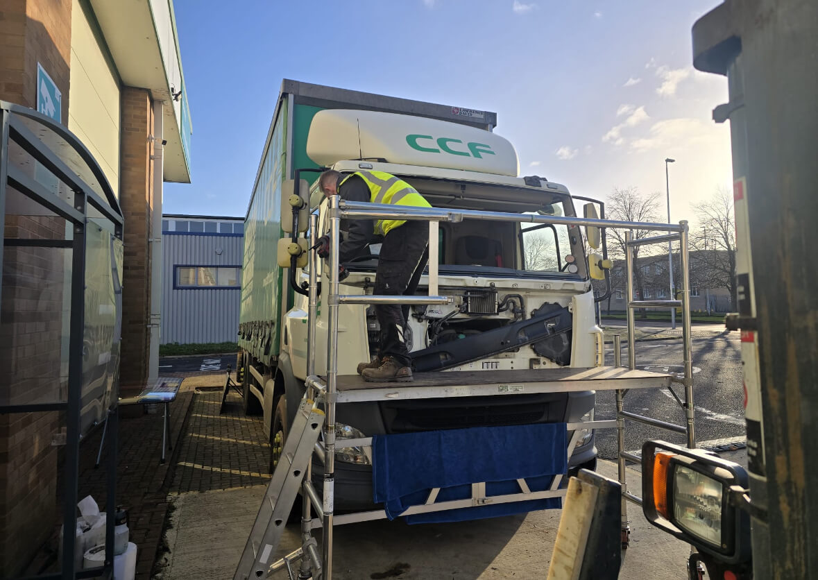 UK Fleet Glass Technician fixing windscreen